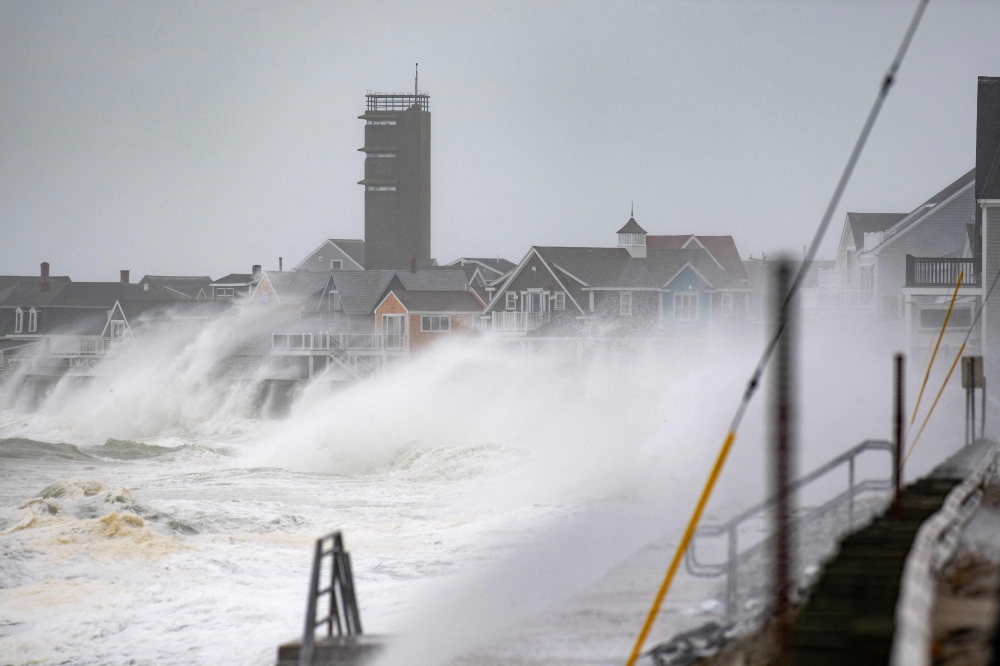 One dead, 60,000 without power as powerful storm batters US Northeast