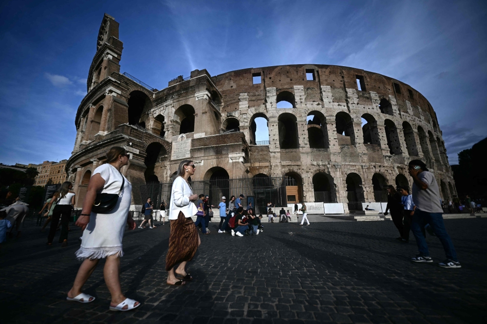 Rome’s Colosseum reopens days after death of worker installing lighting system
