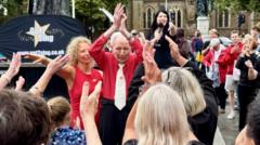 Keep dancing: 100-year-old leads charity flash mob
