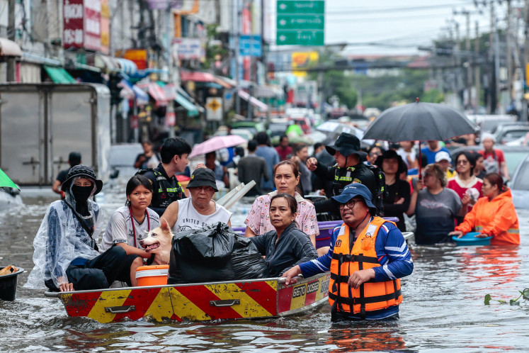 Bangkok floodwaters recede after torrential rain as residents count losses