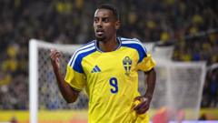 Injured Isak returns to Liverpool from Sweden duty