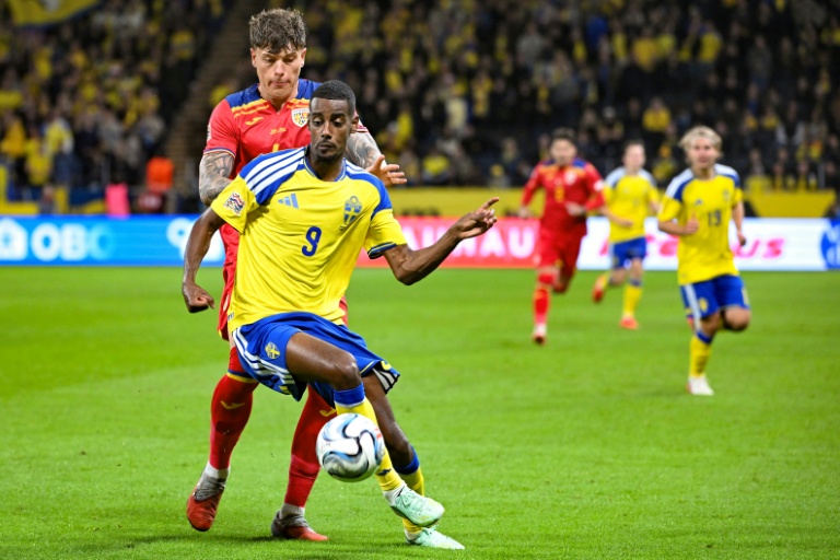 Isak returns to Liverpool after injury scare