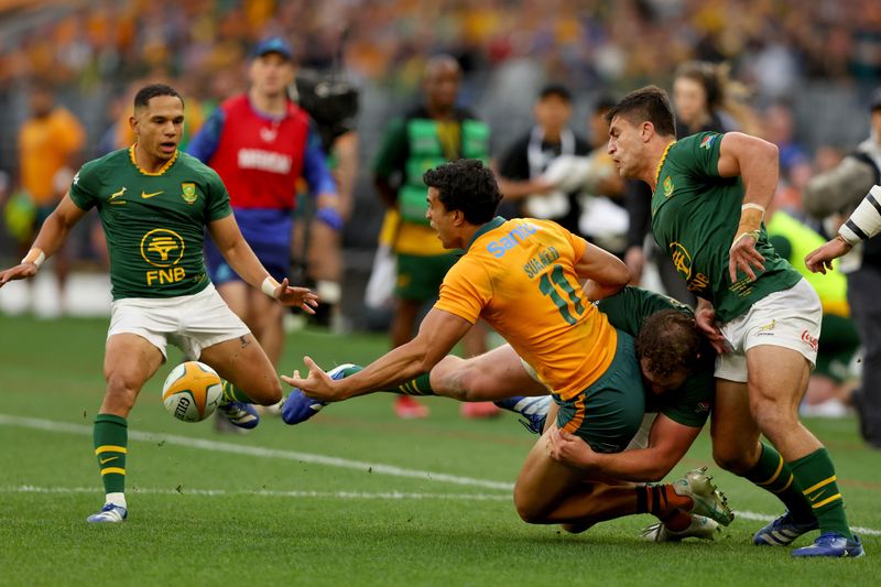 DOWN TO EARTH: Eleven-man Wallabies resist Springboks’ rearguard to secure famous Perth win