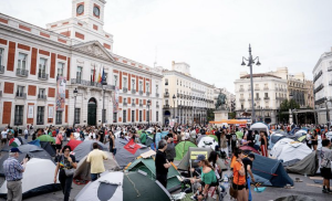 Protesters vow to stay in Madrid’s Puerta del Sol as housing camp puts pressure on government
