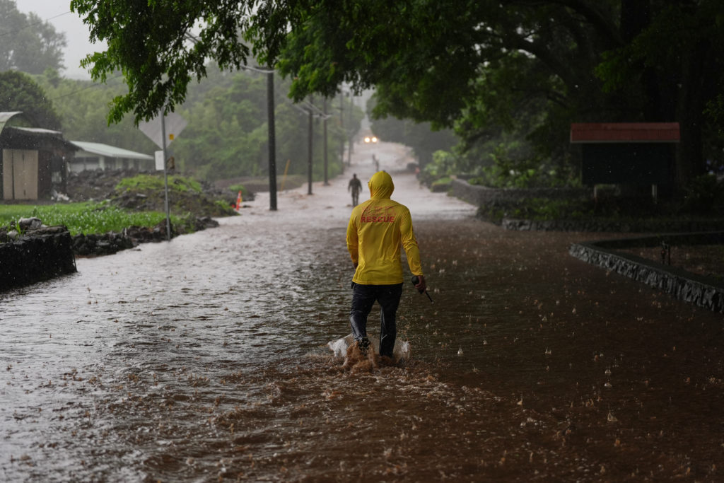 Hurricane Nolo gains speed as it moves away from Hawaii, but high winds, flash floods are still risk