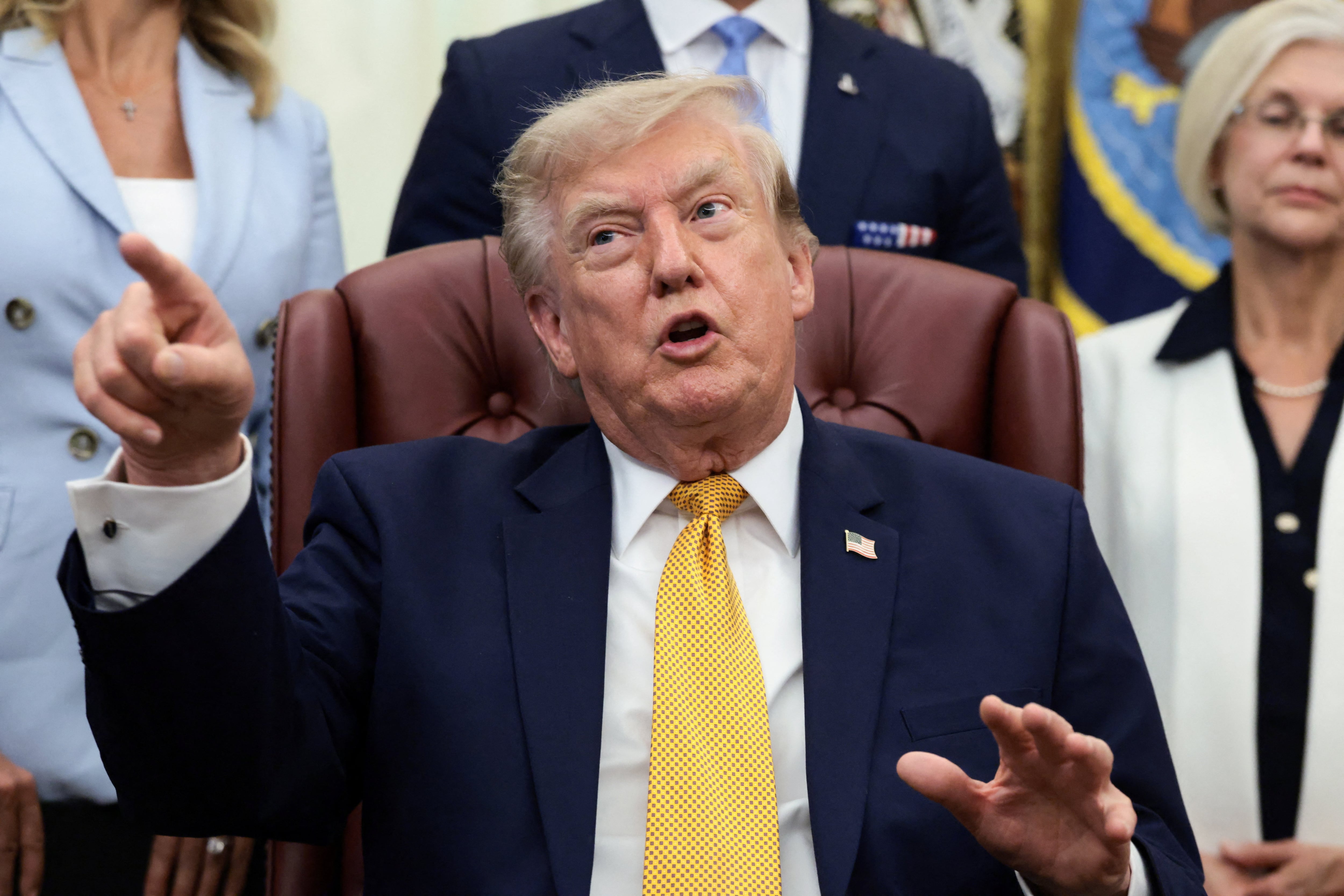 Trump lashes out at Chevron and Exxon's soaring profits during Iran war