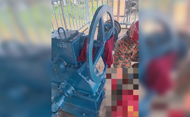 Woman who died after headscarf entangled in floodgate roller was on duty
