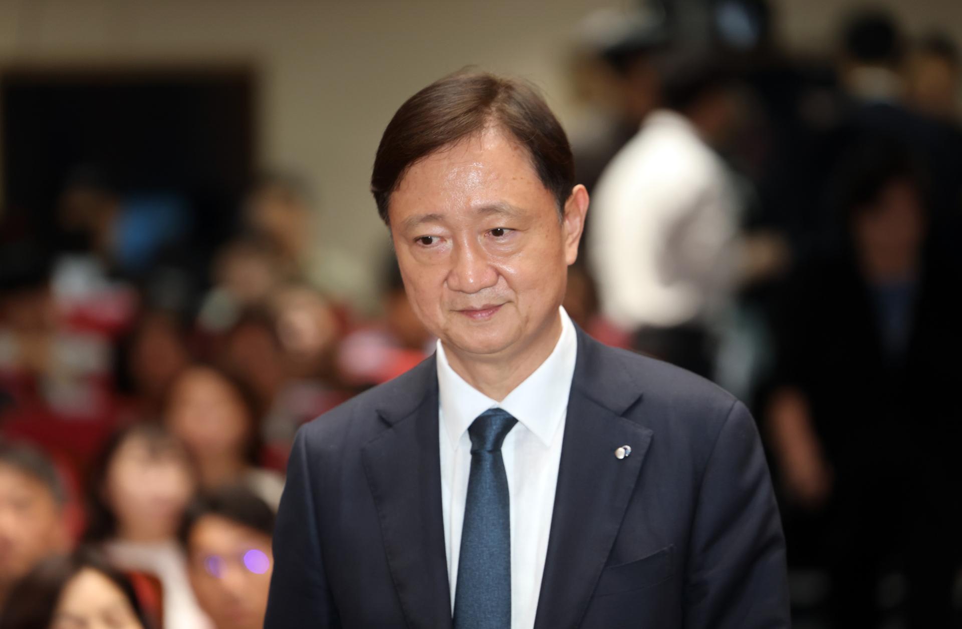 Watchdog chief urges securities firms to shore up shareholder value