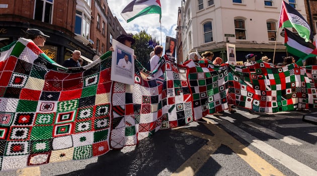 Blanket with square for each child killed in Gaza brings silence to bustling Dublin street