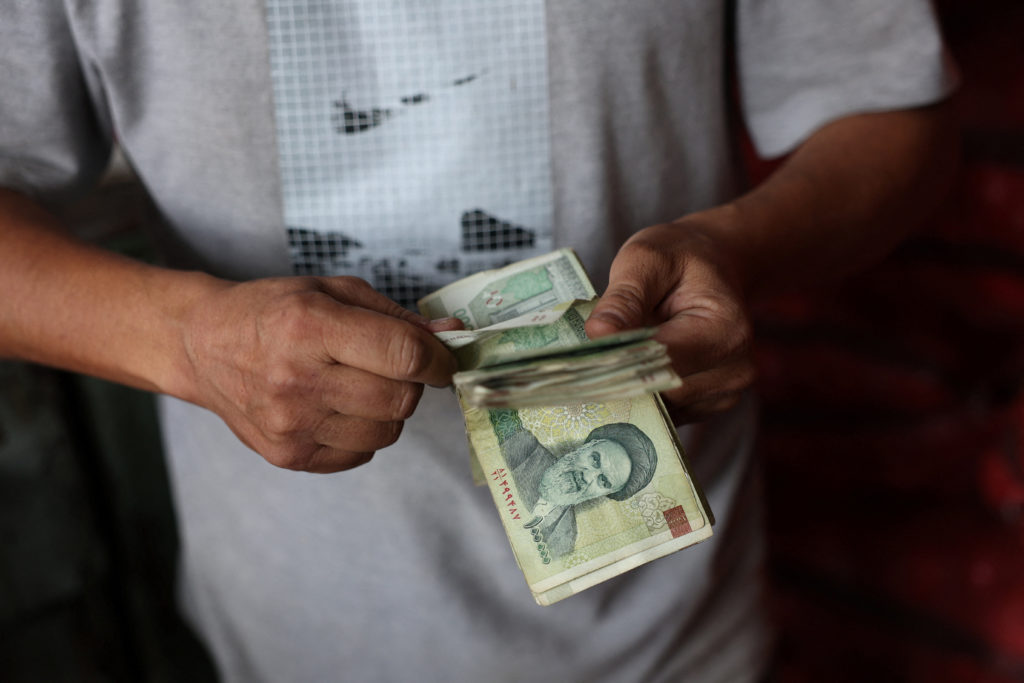 Iran's currency hits a new record low as war erodes the country's economic stability