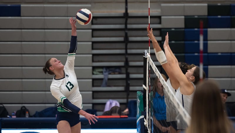 High school girls volleyball: Twin outside hitters lead Syracuse over Skyline