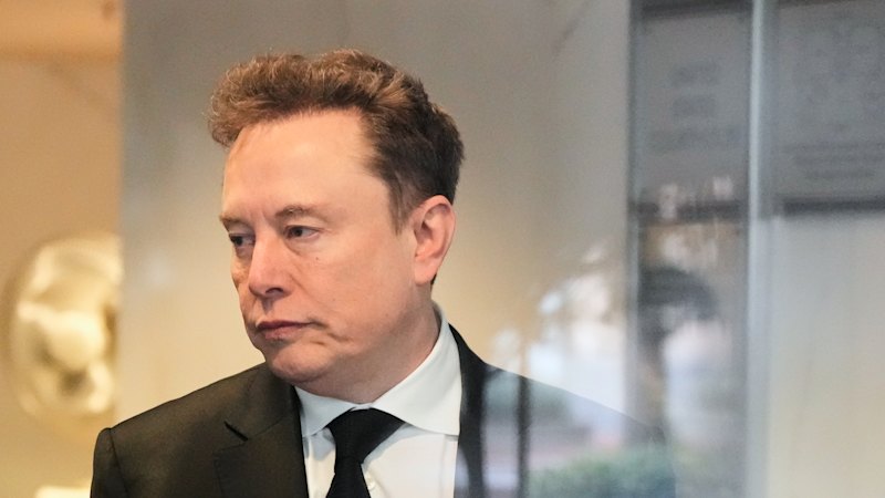 Why the richest man on Earth wants you to think money won’t matter