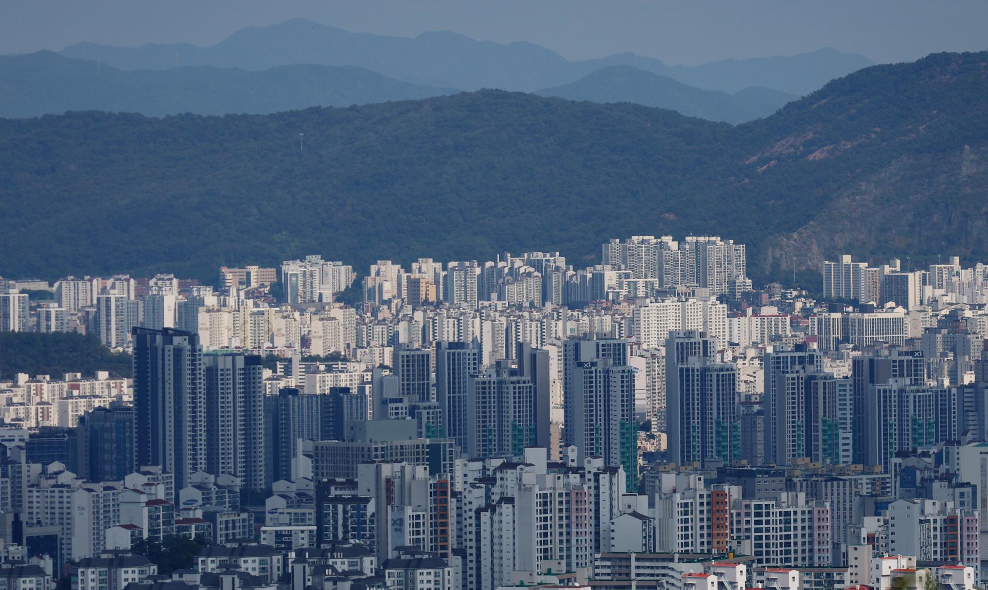Household loans fall for 1st time in six months on tightened rules, higher rates