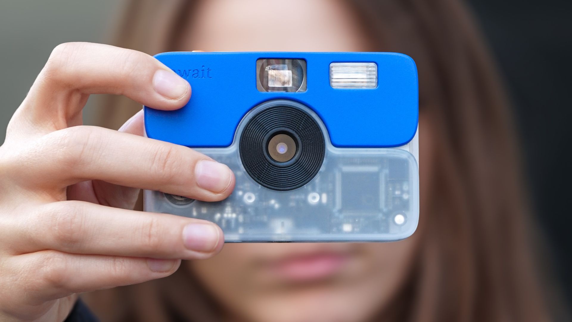 Nearly as small as a credit card, this retro digital compact camera does one thing that other film-like cameras don't – it prints every roll