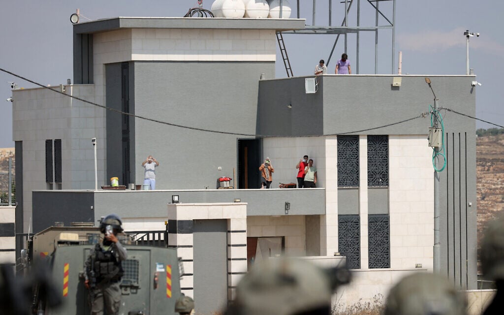 Two Palestinians hurt by settler gunfire, including nurse said to be paralyzed for life