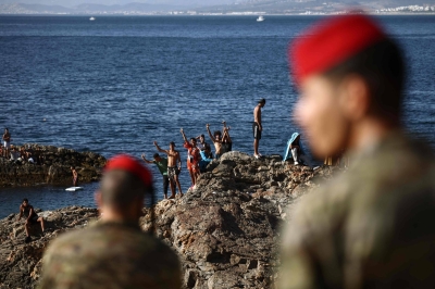 Spain defends Ceuta sovereignty after Moroccan migrant rush