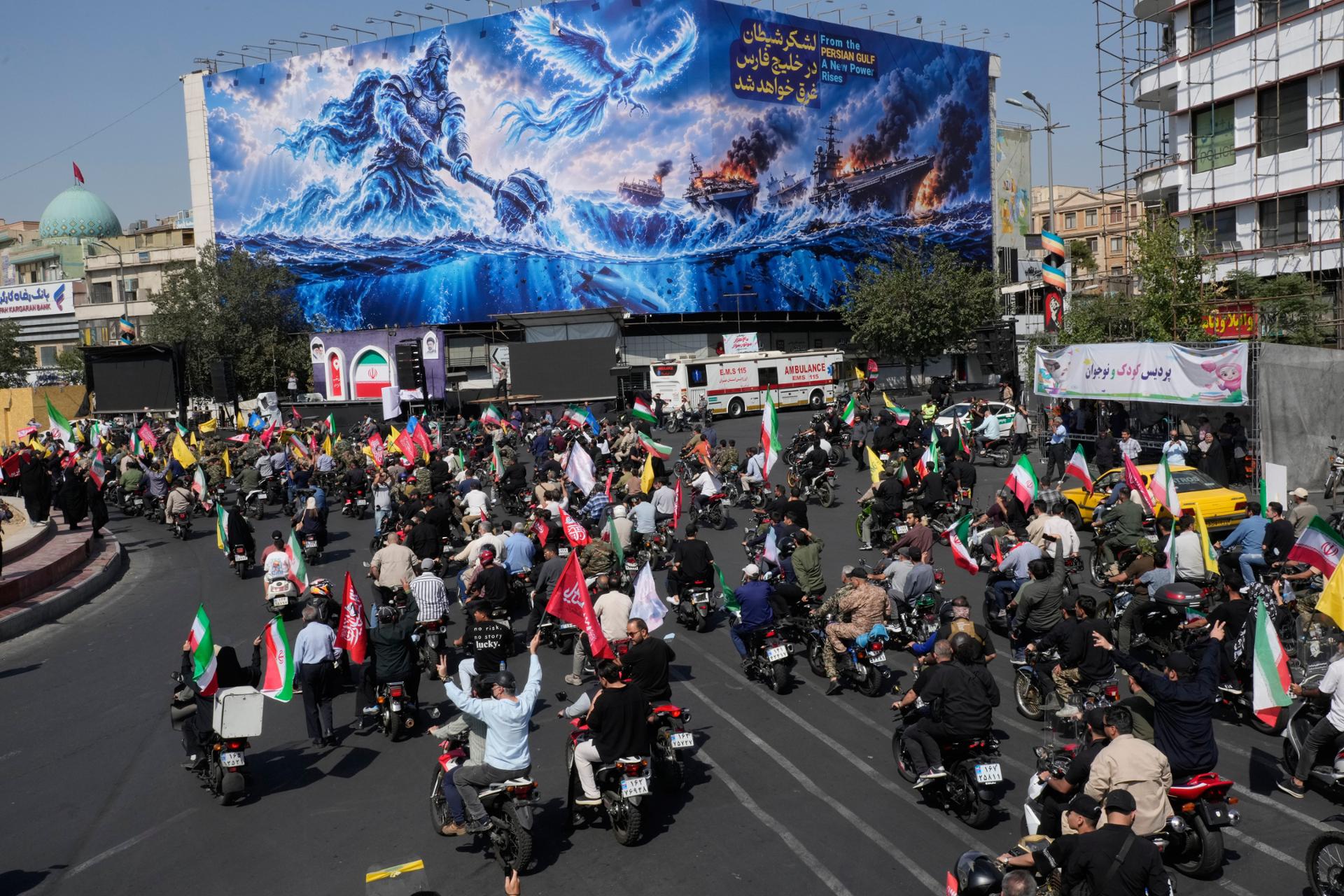 US sanctions target Iran's auto, rail sectors as blockade chokes ship lanes