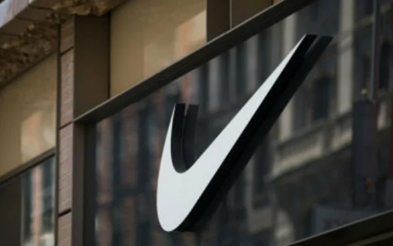 Nike plans job cuts as it forecasts lower sales