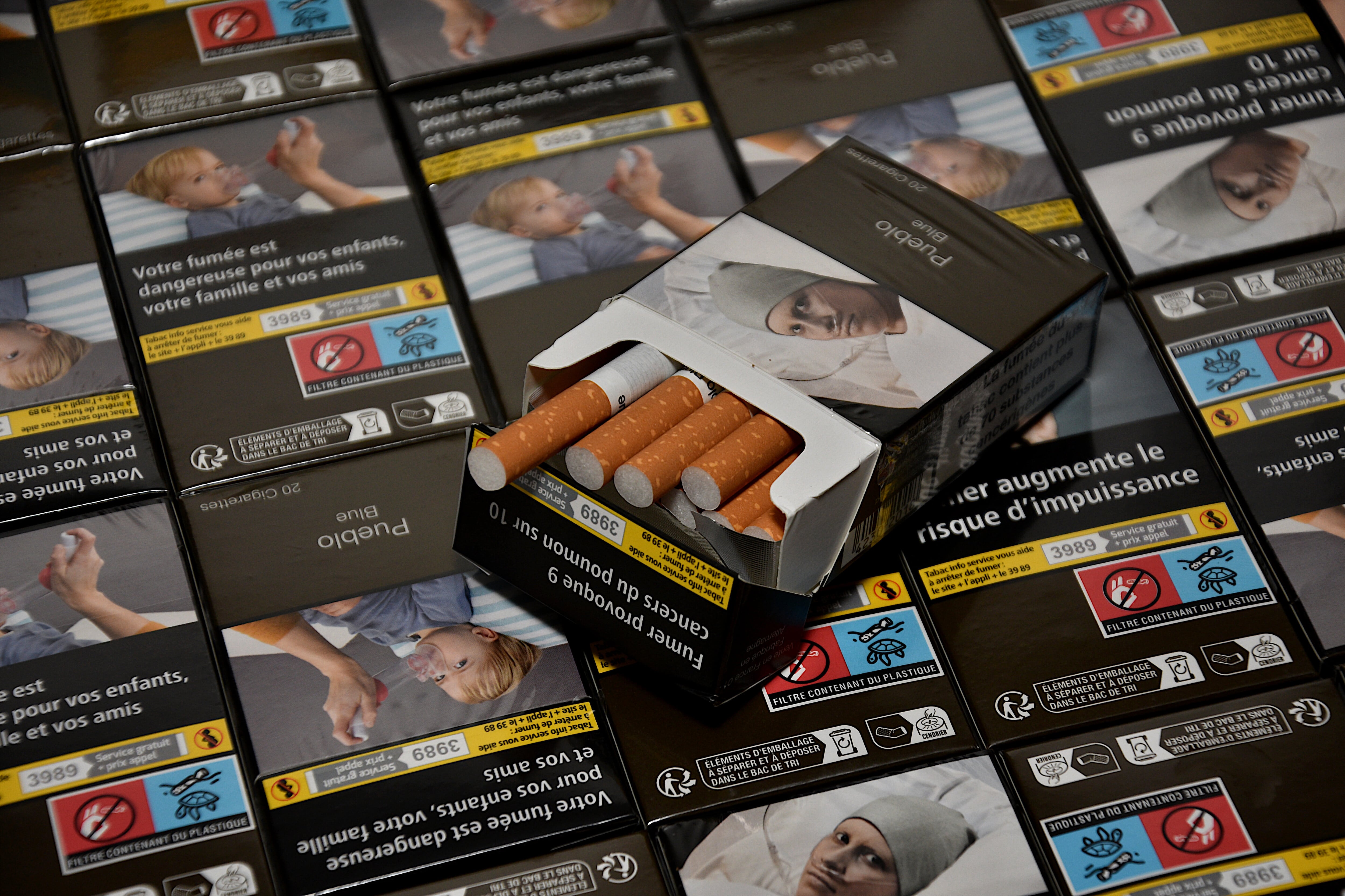 The tobacco companies threatened the government with asking for multimillionaire compensation if they approved generic packaging.