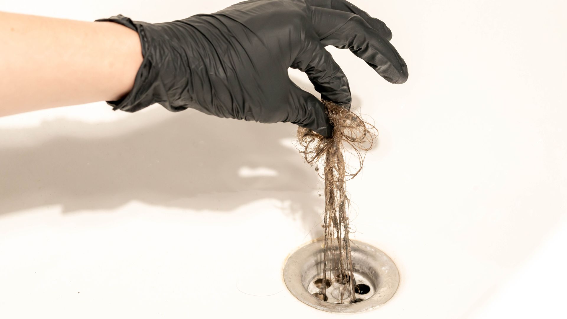 Plumbers warn against using chemical drain cleaners — here is how to clear a clog safely