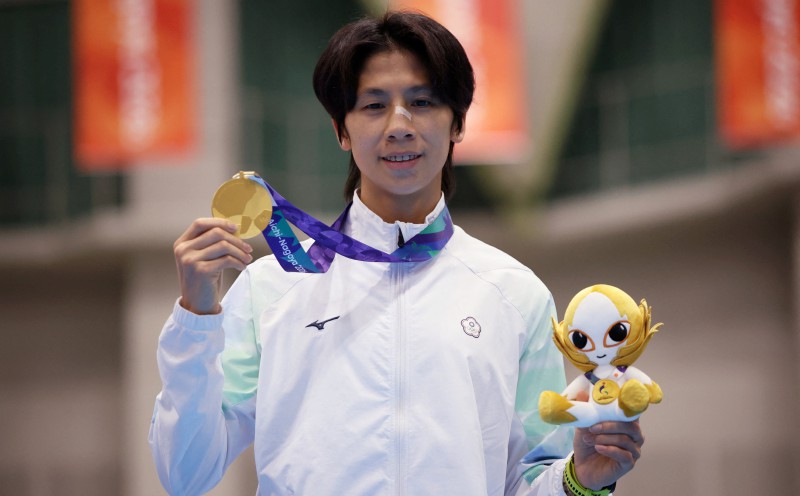 Taiwan boxer Lin wins gold as virtual taekwondo makes Games debut
