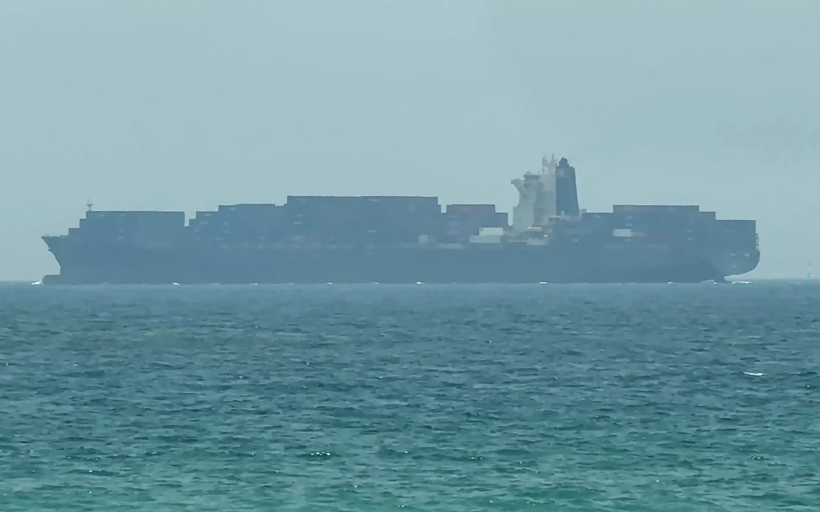 Status of US-Iran talks uncertain as ship struck in Hormuz