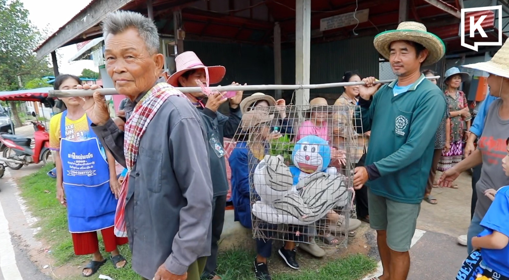 Doraemon replaces real cat in Thai rain ritual