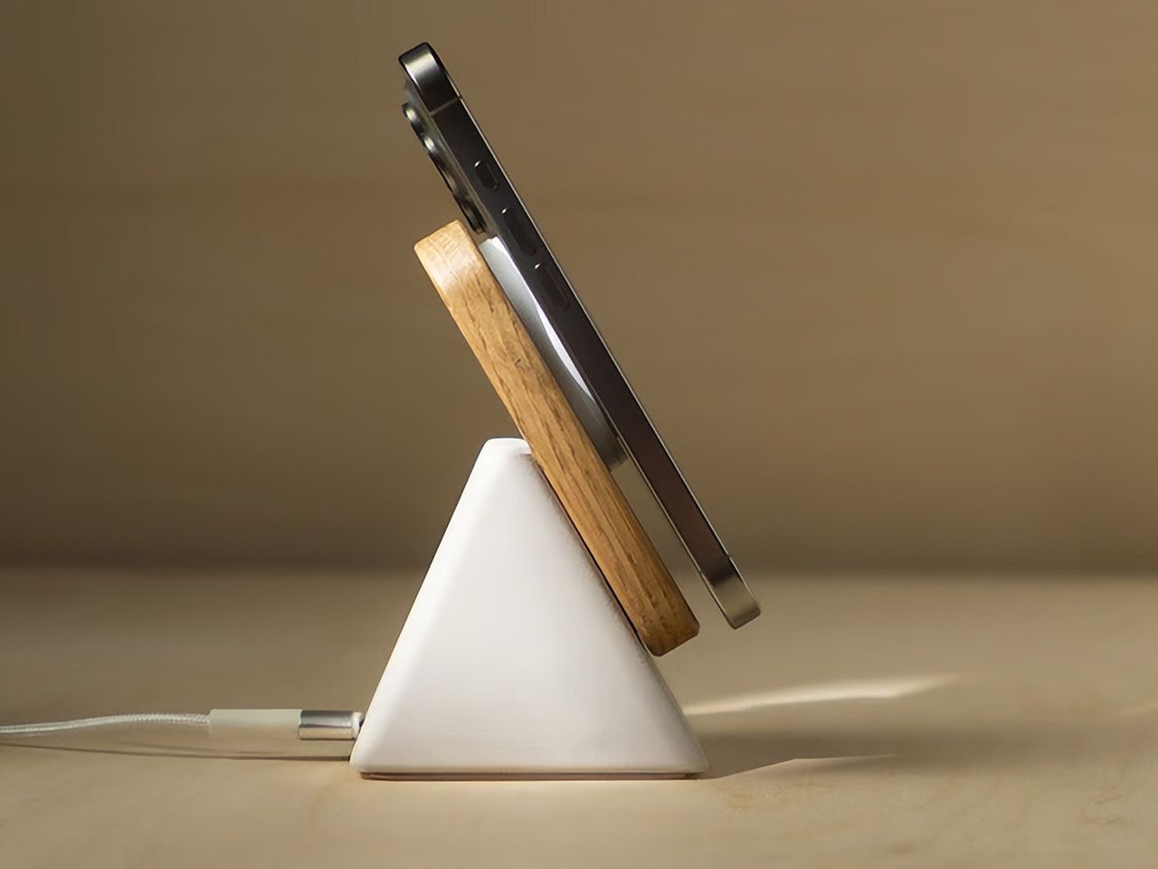 This Qi2 Charger Skips Plastic for Concrete and Hardwood