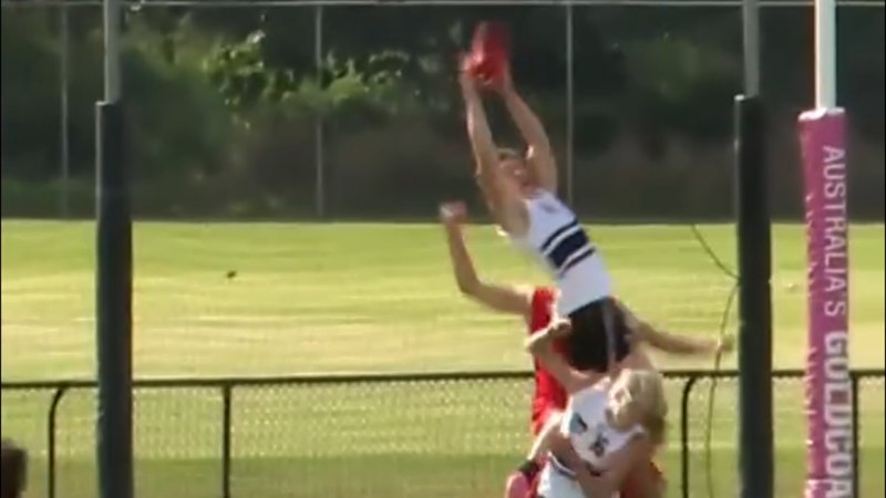 AFL draft prospect Sam Gayfer flies for a mark