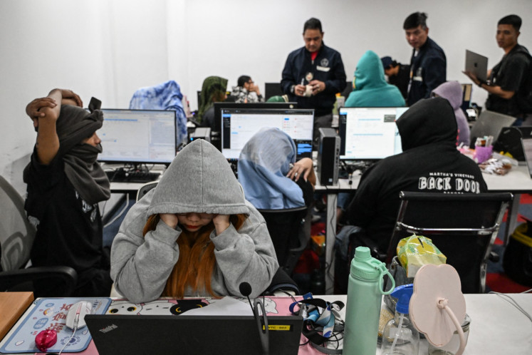 Philippines arrests 244 foreign workers in online scam crackdown