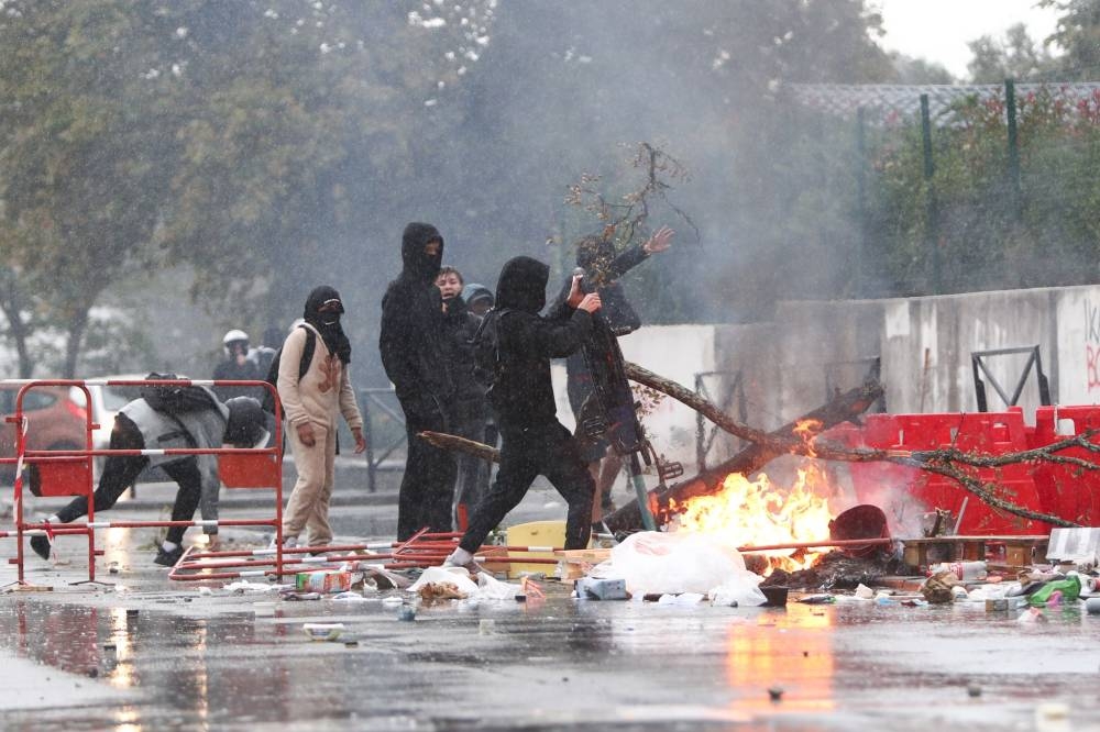French pupils call for new protests on Tuesday as classes restart after riots