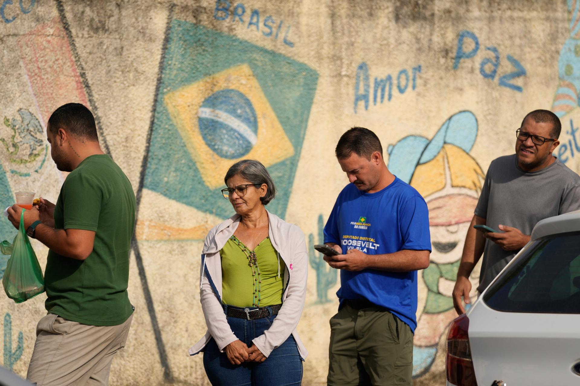 Brazil election headed to runoff, projection shows, as Bolsonaro lead narrows