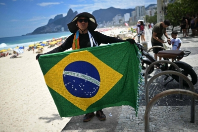 Brazil election headed to runoff, projection shows, as Bolsonaro lead narrows