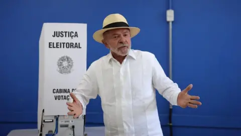 Brazil election goes to run-off as right-wing Flávio Bolsonaro wins first round