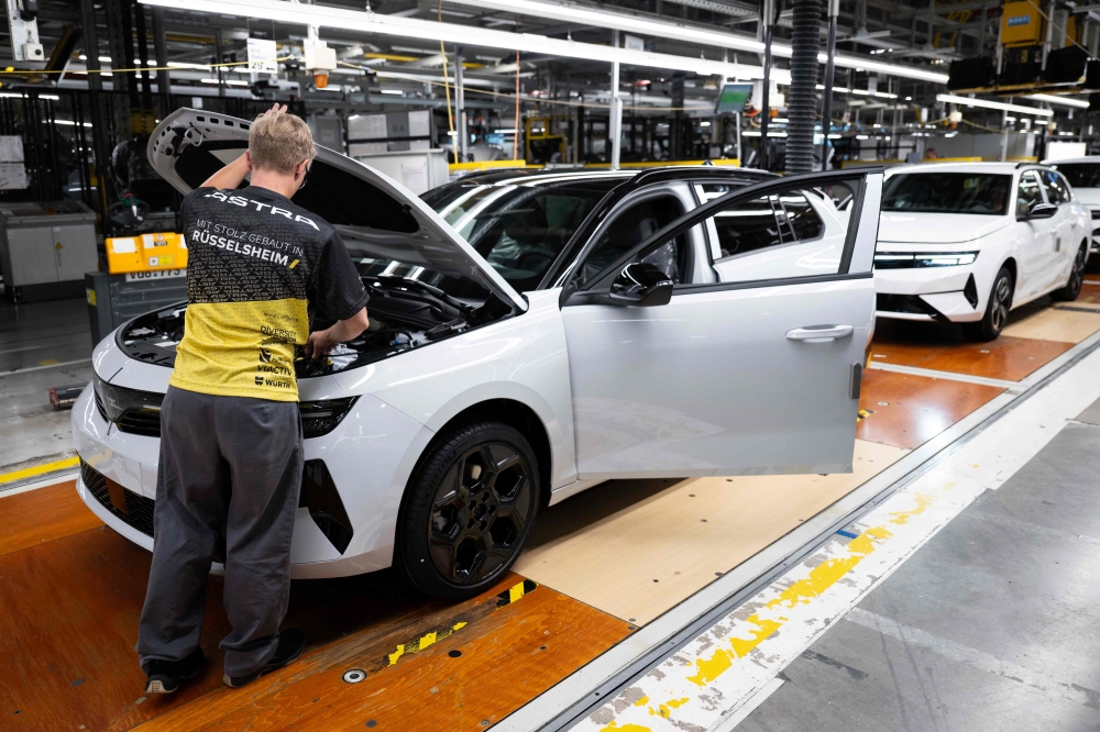 Opel job cuts leave German car town fearing China’s growing auto power