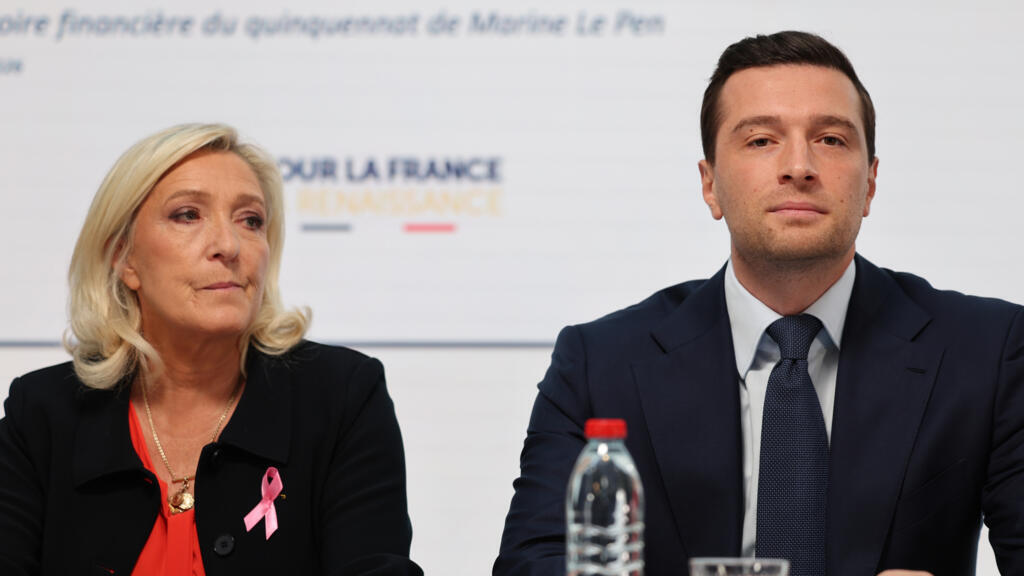 Le Pen vows drastic cost savings to prevent French 'default'