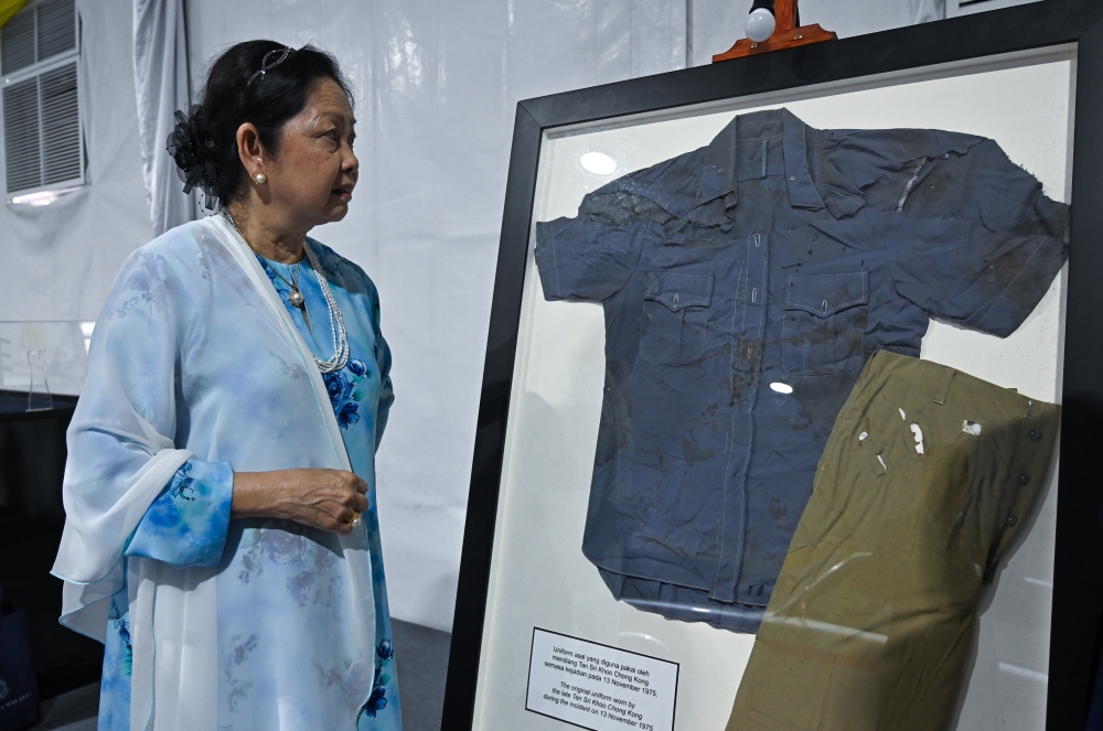 Nearly 51 years later, daughter of former Perak police chief Khoo Chong Kong remembers the man behind his uniform