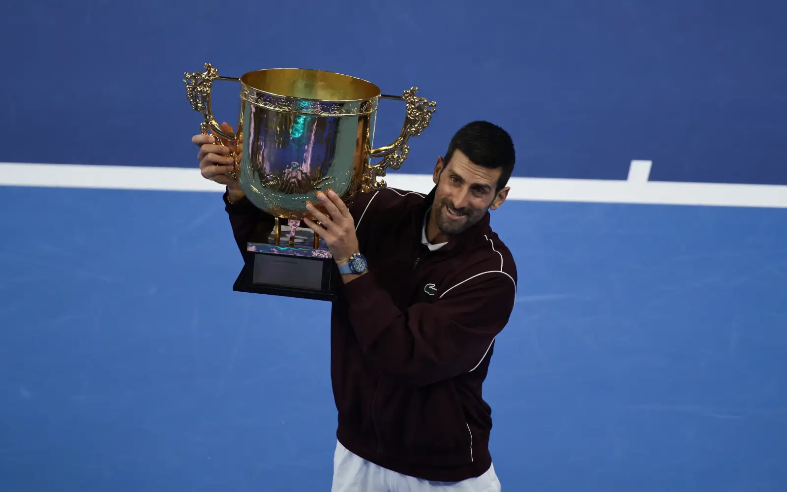 Djokovic wins China Open and keeps unbeaten record after de Minaur retires