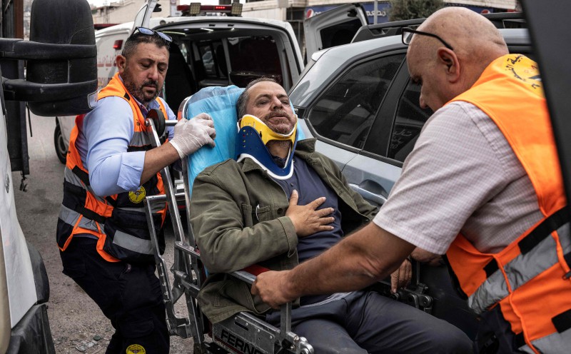 Israeli settlers beat AFP photographer covering West Bank