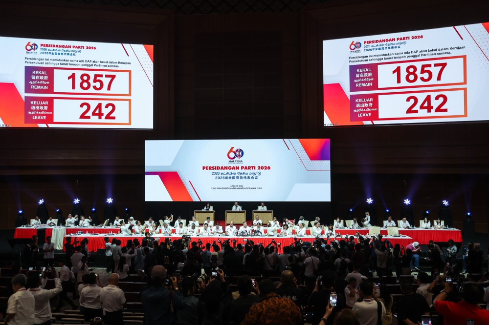 Status quo for now, DAP delegates vote to stay in govt