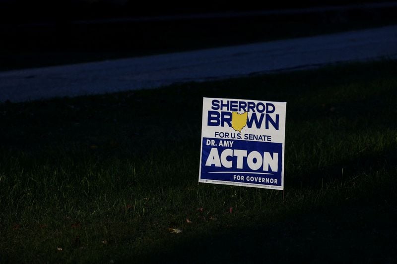 ’I’m getting fed up’: voters line up before dawn as early voting begins in Ohio