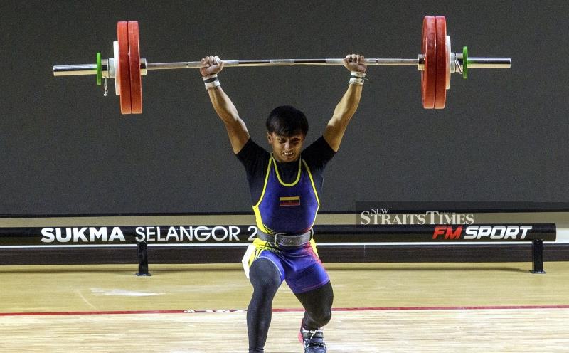 Olympic champ Hidilyn's words of wisdom power Darwisy to Sukma gold