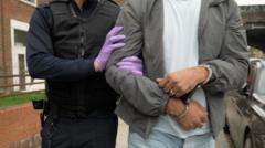Three arrested after raid on gang accused of helping migrants pretend to be gay to get asylum