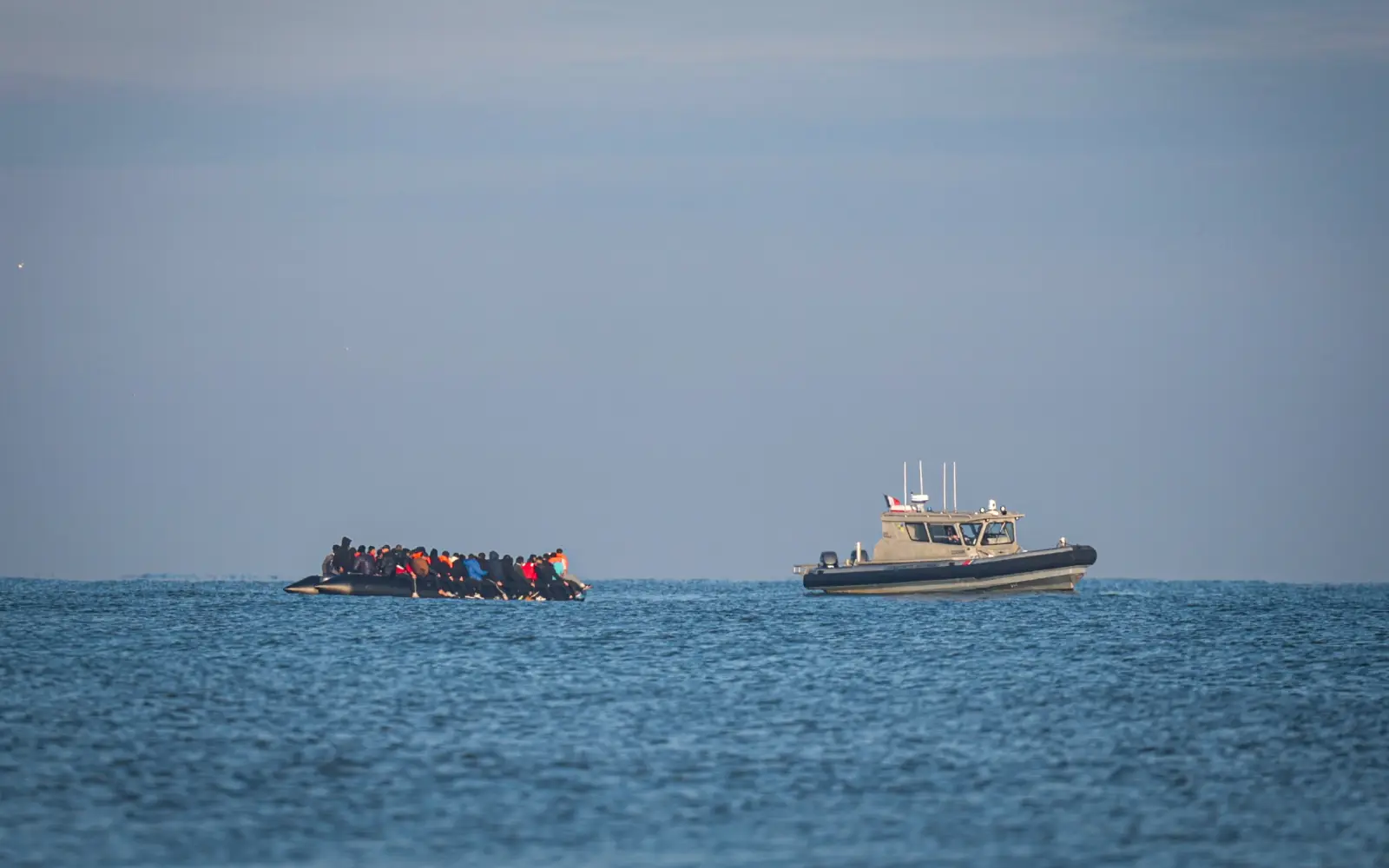 Nearly 160 migrants rescued after boat catches fire during Channel crossing
