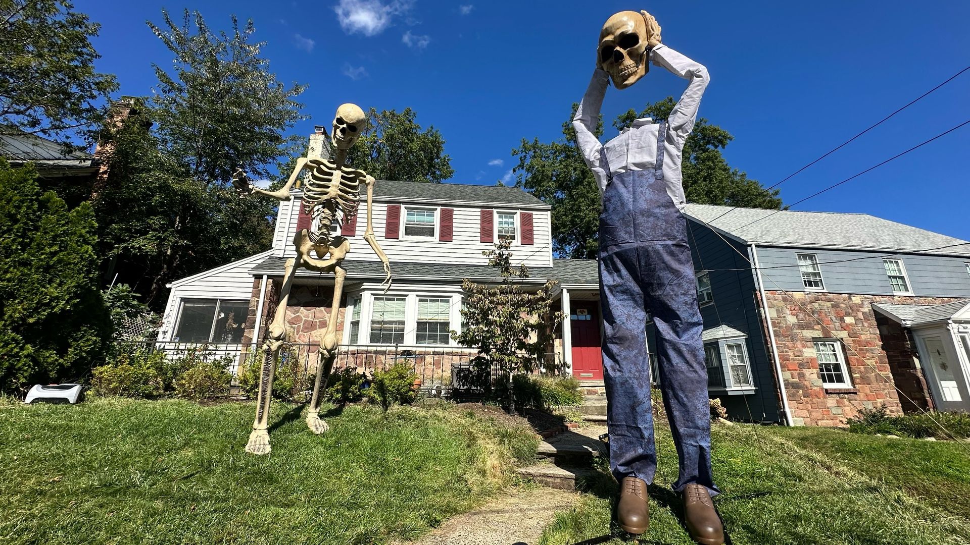 Home Depot 12-foot Skelly vs. Lowe’s 15-Foot Watcher: I put Halloween's biggest decorations to the test in my yard
