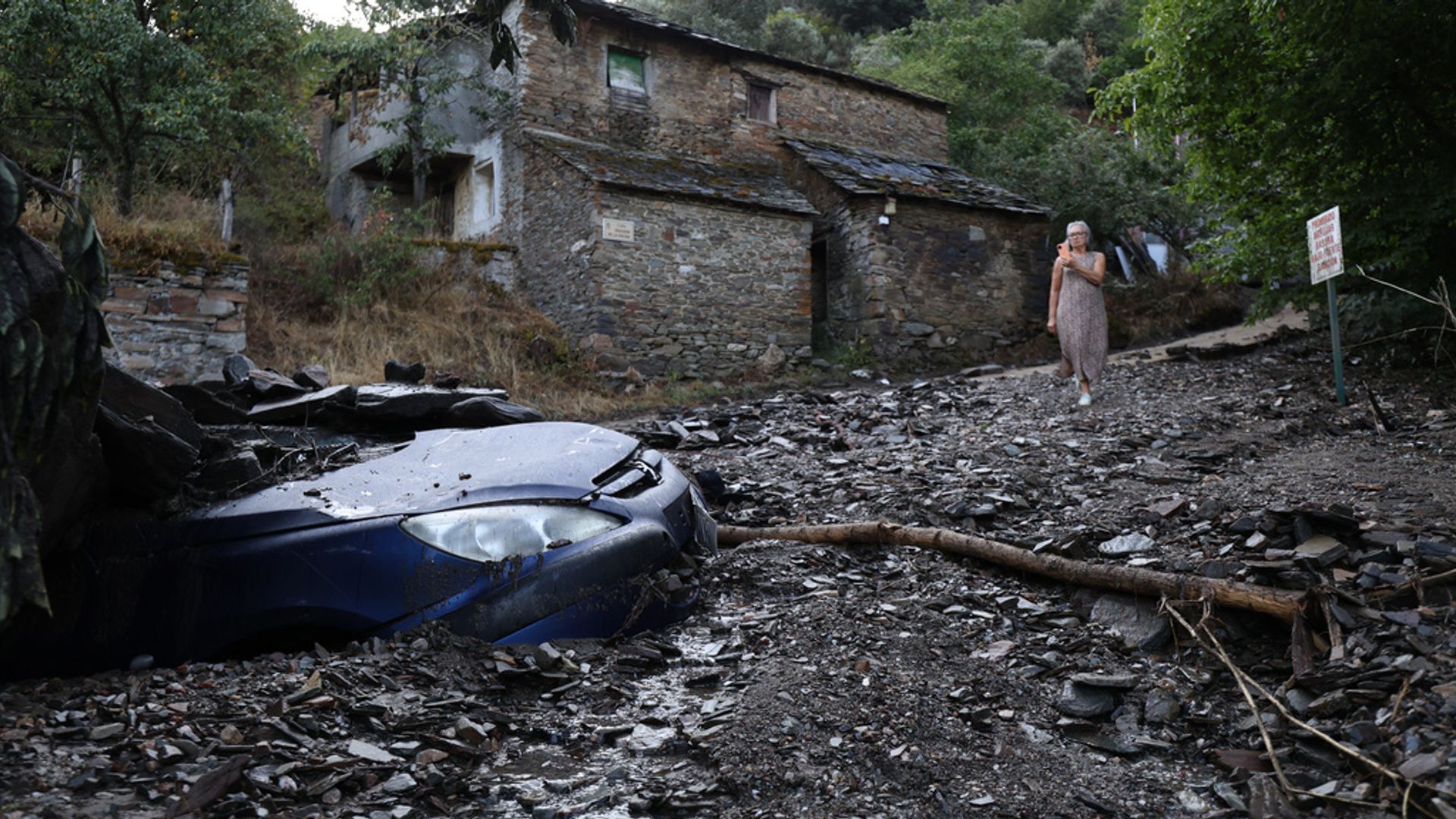 Two die in Spain mudslide as Belgium battles largest-ever wildfire