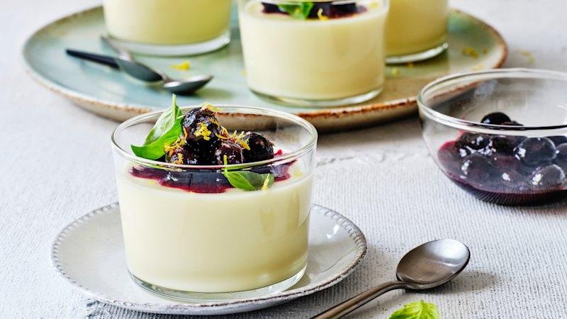 Lemon possets with blueberry spoon fruit