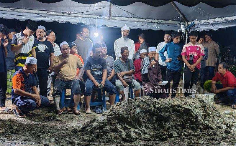 Woman who died after headscarf became entangled in water gate roller laid to rest