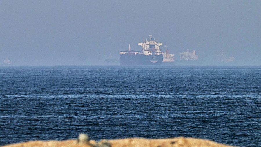 Cargo ship reports being struck in Strait of Hormuz