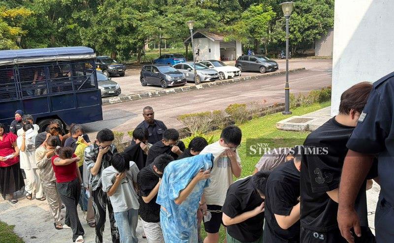 29 foreigners linked to online scratch-and-win syndicate fined for immigration offences